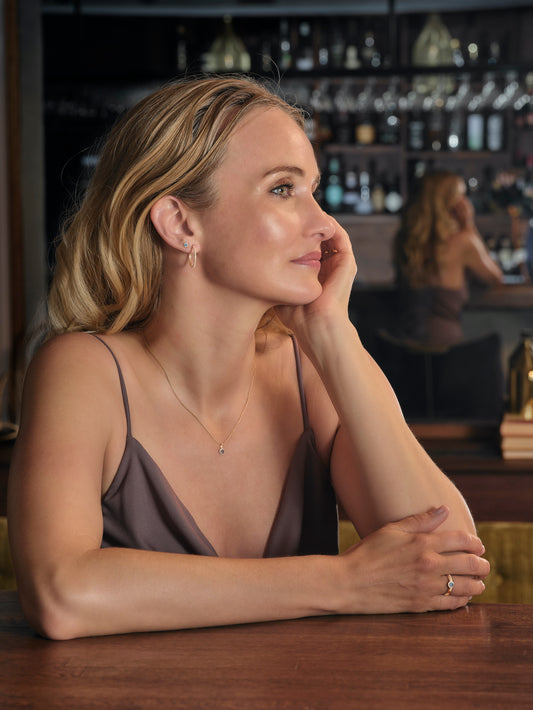 Siersbøl - Rossetøreringe i 14kt guld med diamanter 0,05ct w/si og grønne granater